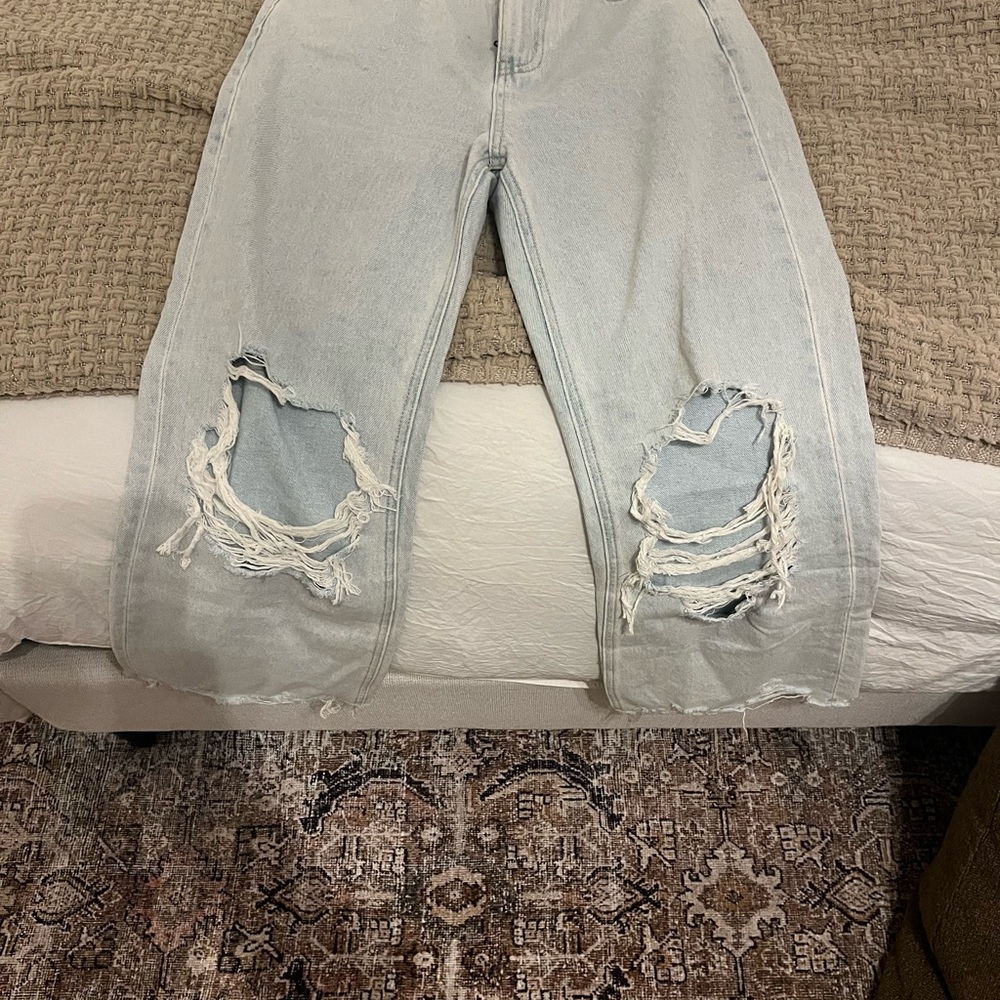 Distressed Light Blue Jeans